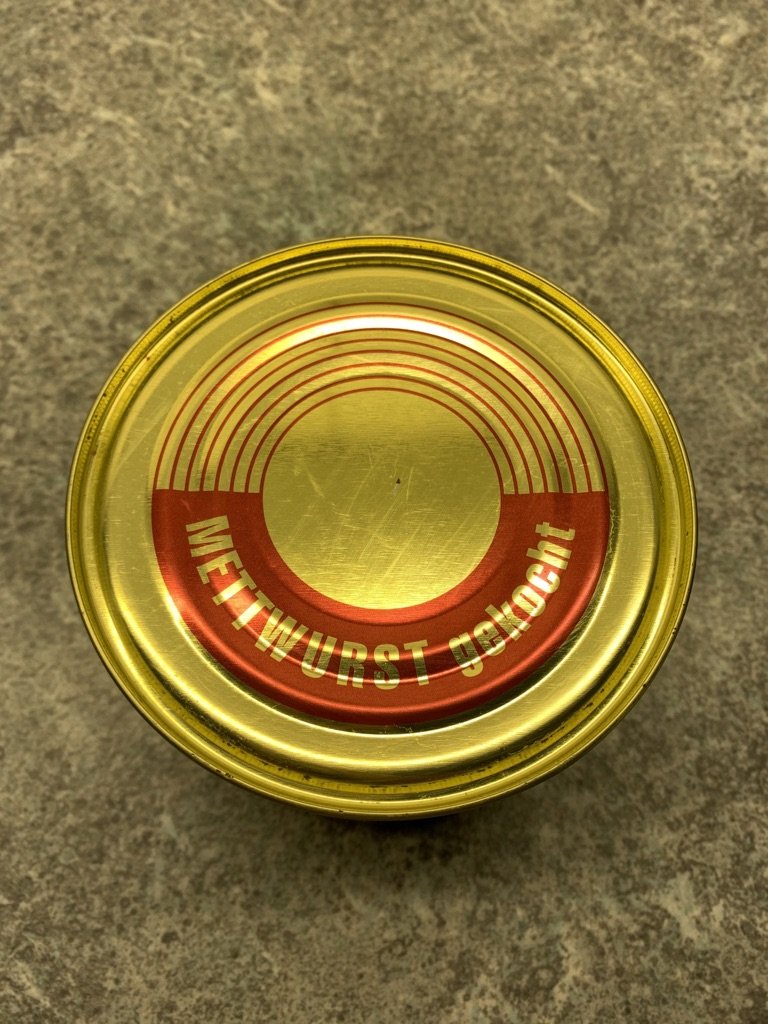 Gekochte Mettwurst in der Dose